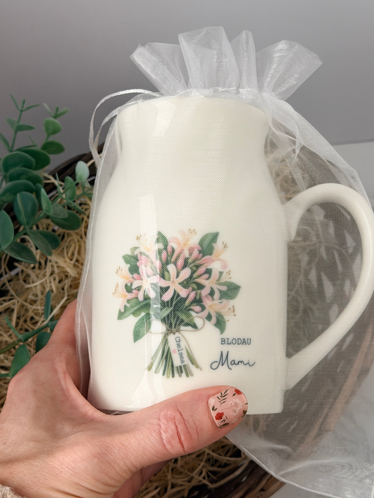 Personalised birth flower jug presented in an organza gift bag, ready for gifting