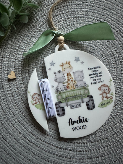 Personalized acrylic keepsake with safari animals and a green jeep, personalised with baby's name, date of birthday, weight and length if know. Each gift includes a tape measure.
