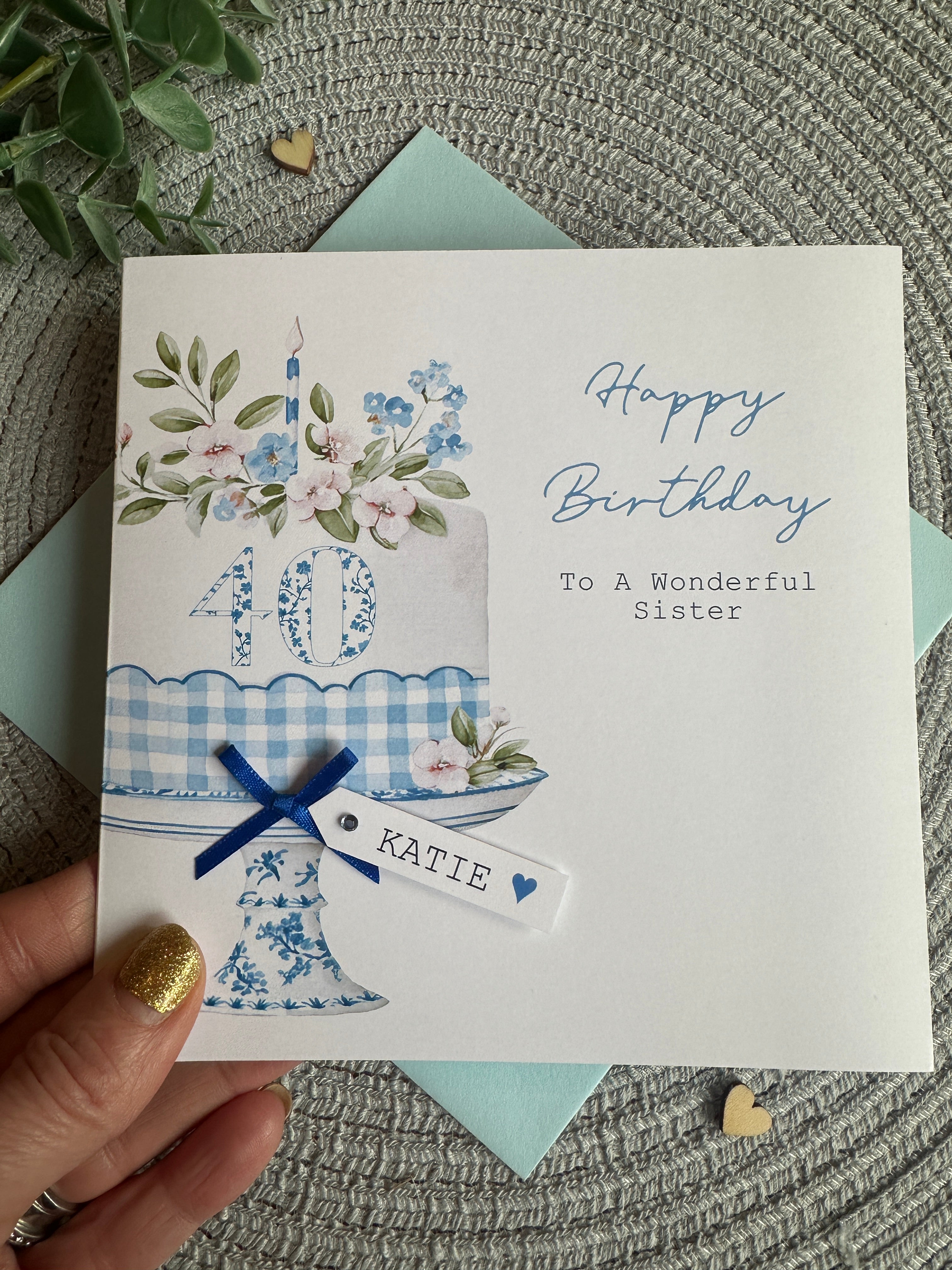 Birthday card for a sister with decorative elements and personalised wording.