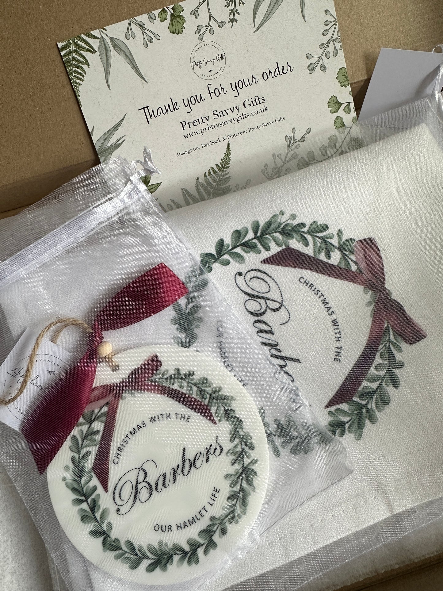 Personalised Christmas Red Bow Tea Towel; Christmas with the Family