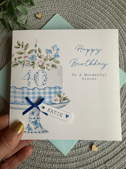Birthday card for a sister with floral design and text on a textured surface