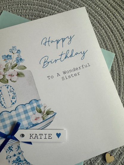 Personalised birthday card with blue florals and gingham check.