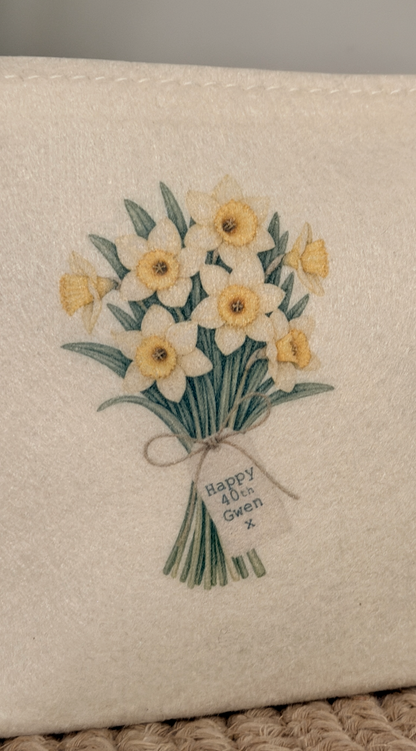 Personalised floral makeup and accessory bag with custom wording options, this bag shows the daffodil design.
